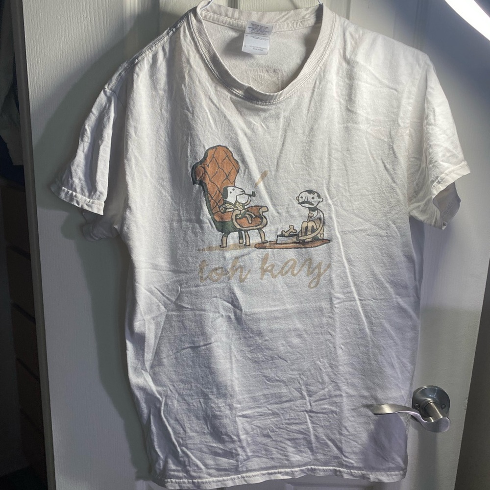 Tan off white Toh Kay band shirt from the first time they played montreal